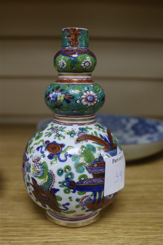 A Chinese enamel vase and two Chinese dishes